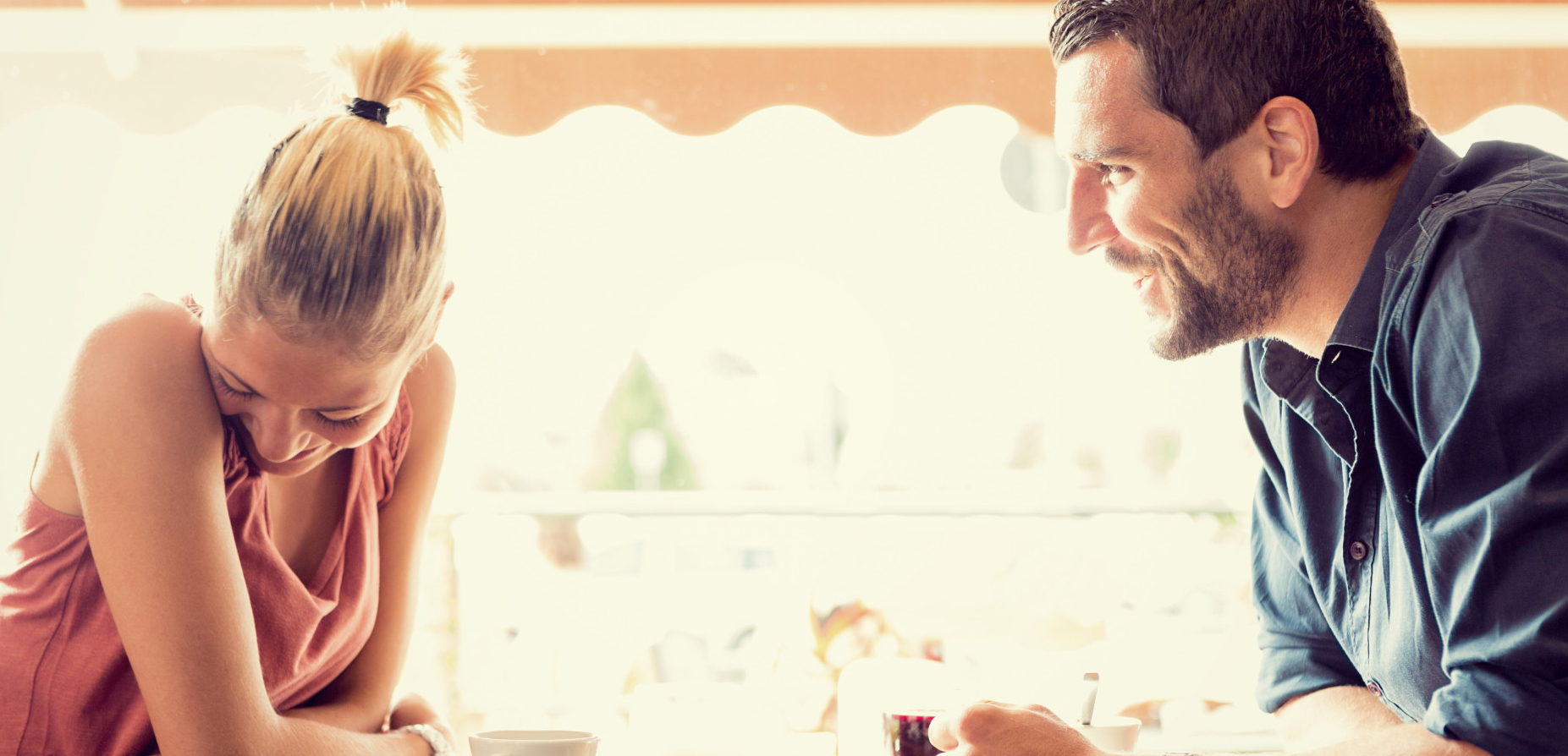 Young couple has breakfast at italian cafÃ©